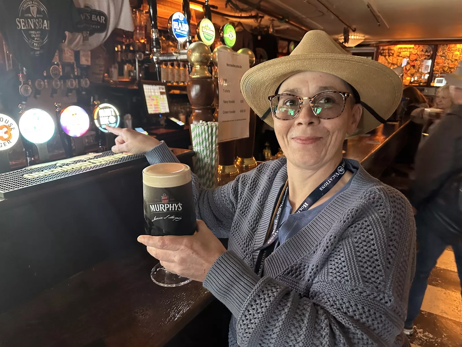 Guest with Local Beer at a Pub in Ireland