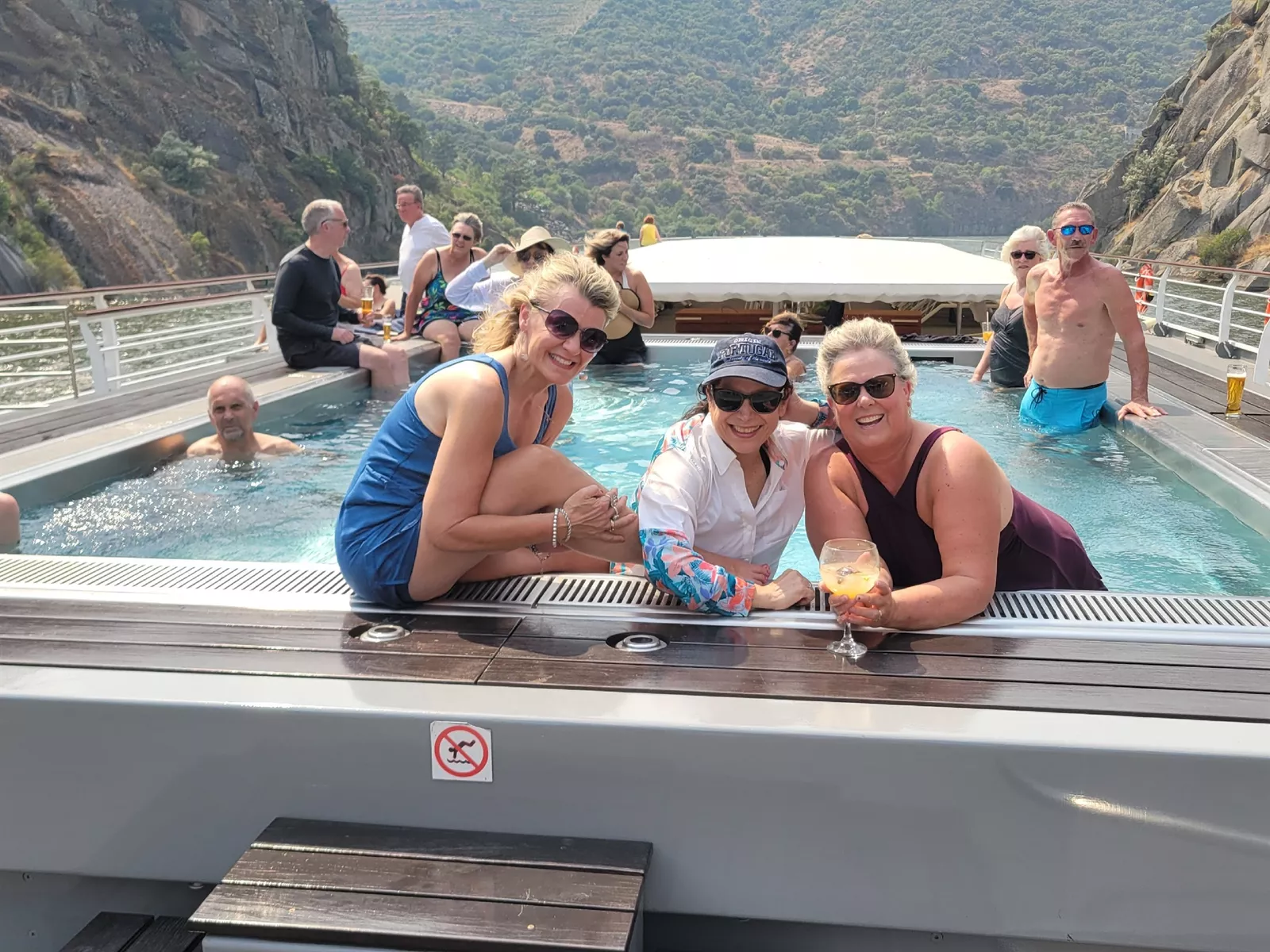 European River Cruises 2026: Holiday Vacations guests enjoying the pool on top deck of cruise ship, Portugal & Spain on the Douro River
