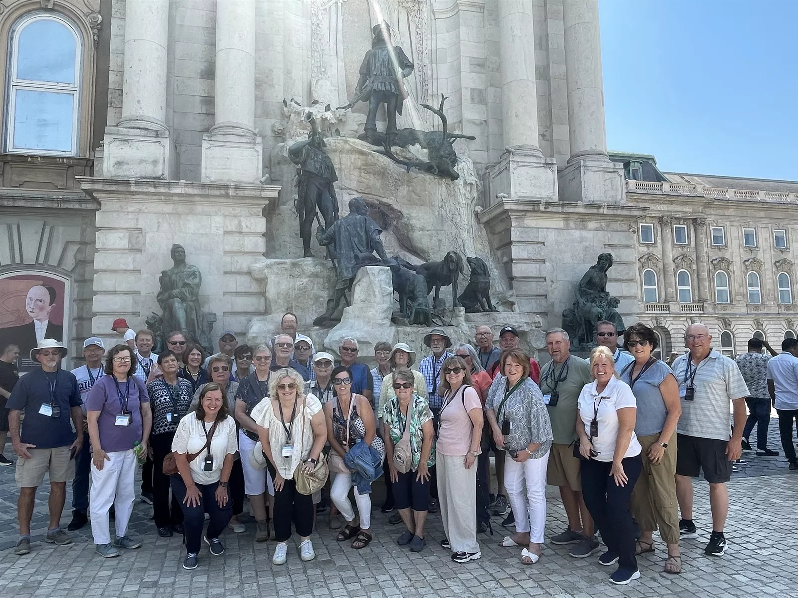Holiday Vacations guests with Fountain of King Matthias