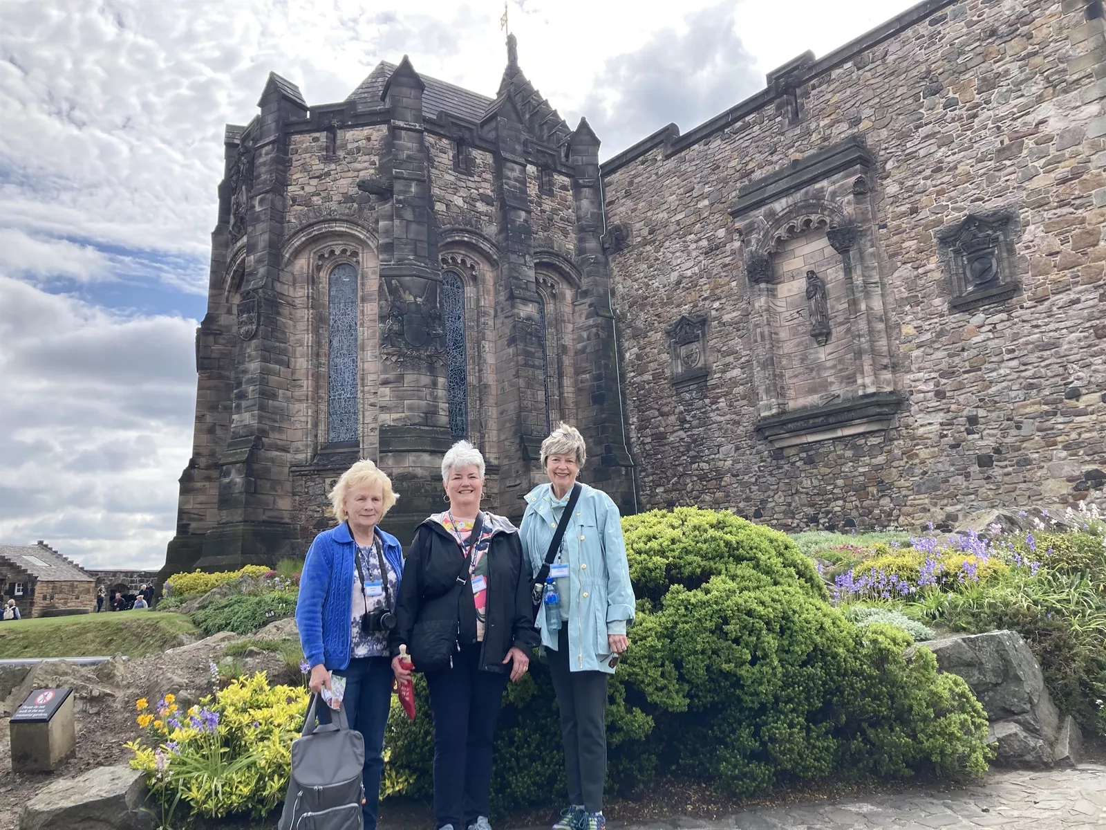 Holiday Vacations guests in front of Edinburgh Castle, Scotland