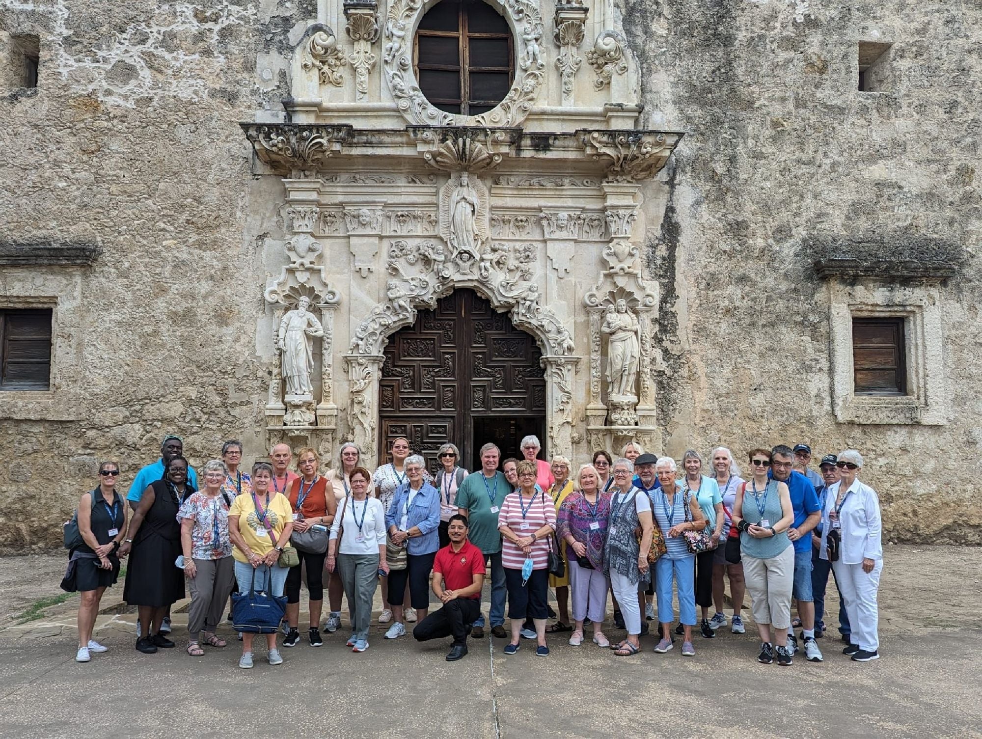 Holiday Vacations guests outside the Alamo