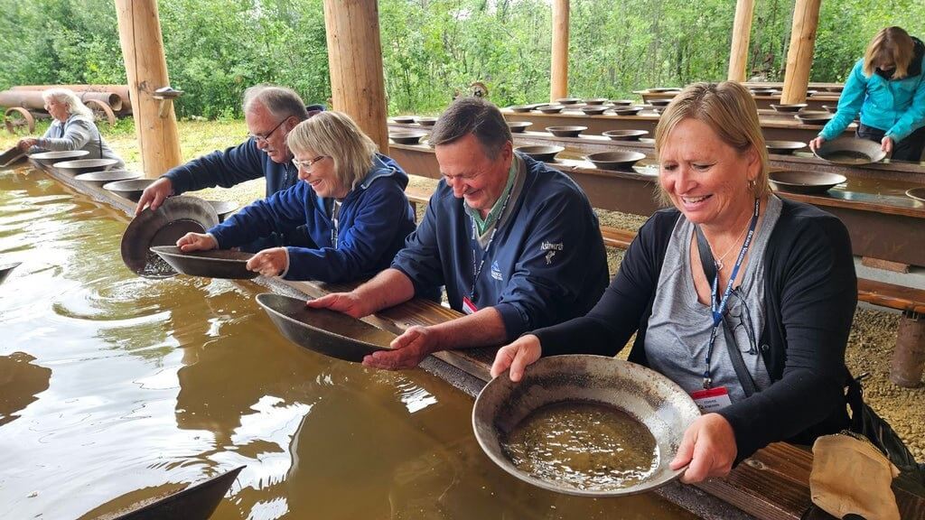 Guests panning for gold in Alaska