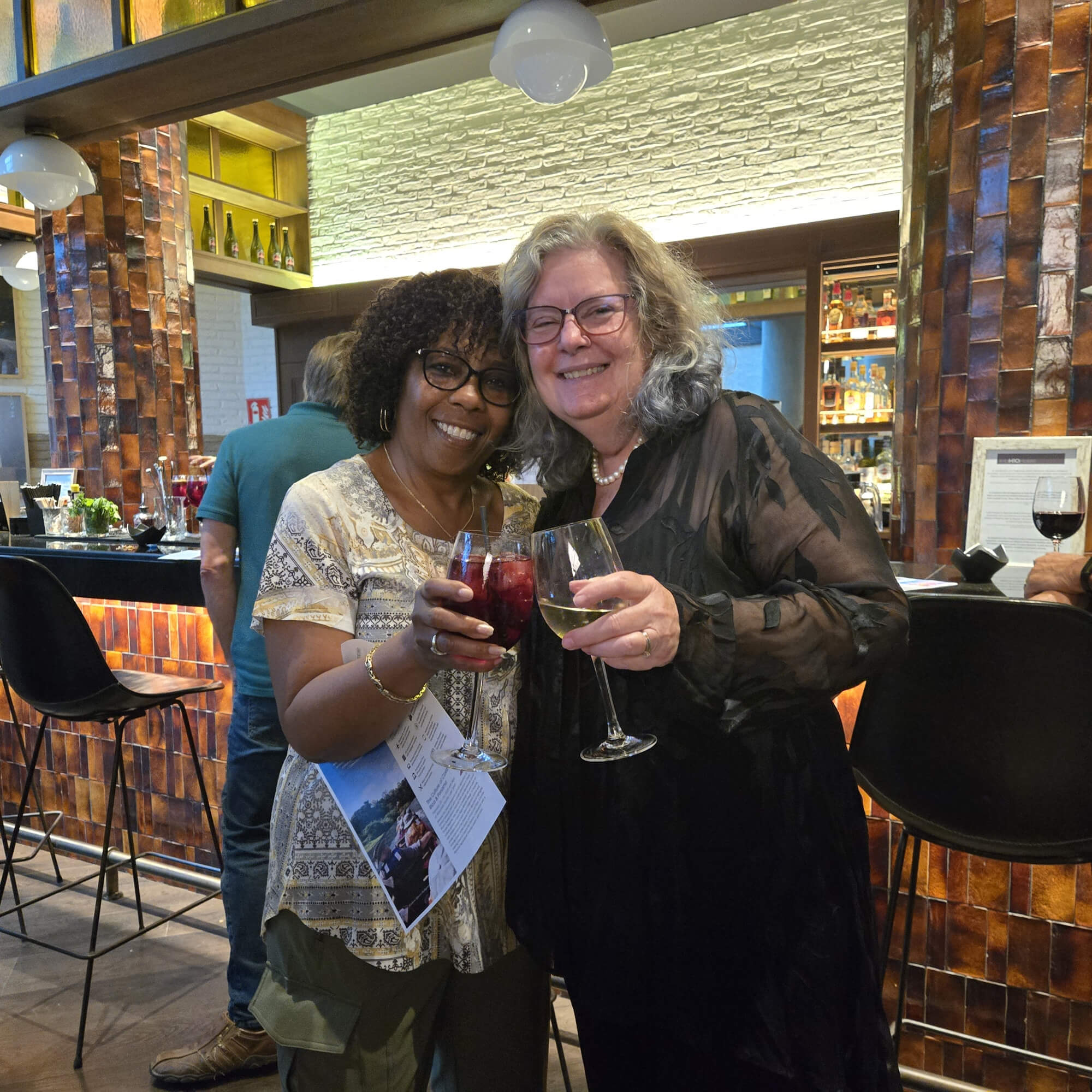 Guests enjoying food and drinks in Spain